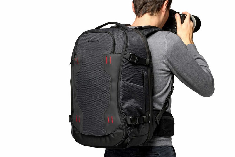 Manfrotto Pro Light Flexloader Backpack being worn by a photographer.