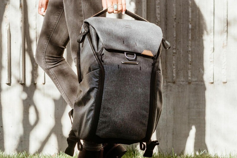 Peak Design Everyday Backpack being held by a woman. 