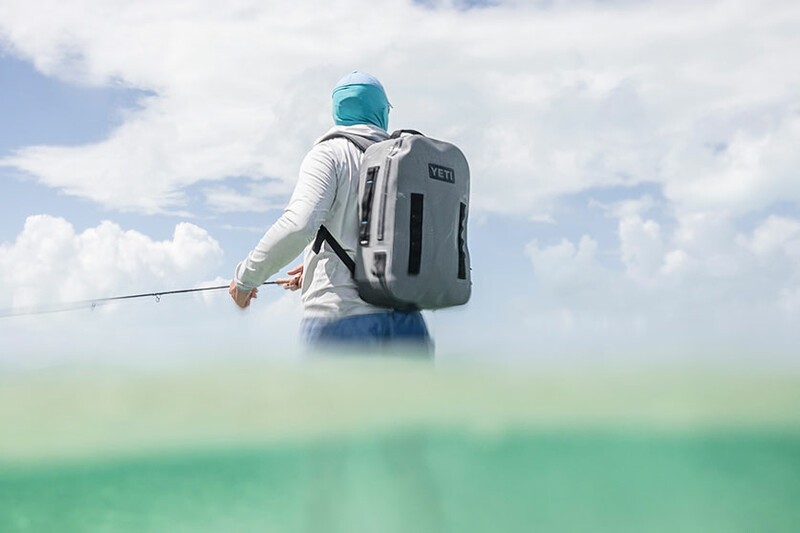 Yeti Panga backpack being worn by fisherman.